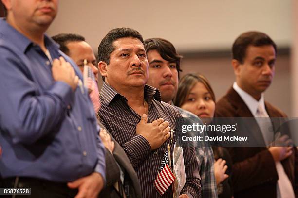 More than 2,700 people are sworn in as US citizens during naturalization ceremonies on April 9, 2009 in Montebello, California. President Barack...