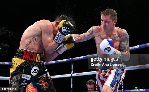 Ricky Burns lands a right shot on Anthony Crolla during the Lightweight contest at Manchester Arena on October 7, 2017 in Manchester, England.