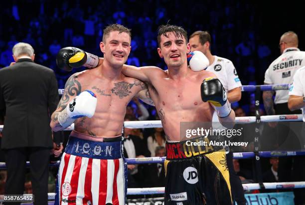 Anthony Crolla and Ricky Burns embrace after their Lightweight contest at Manchester Arena on October 7, 2017 in Manchester, England.