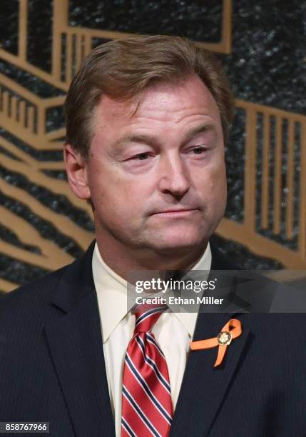 Sen. Dean Heller speaks at the culmination of a faith unity walk, held to help the community heal after Sunday's mass shooting, at Las Vegas City...