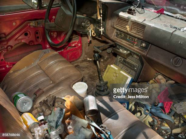 old car interior full of trash - messy car interior stock pictures, royalty-free photos & images