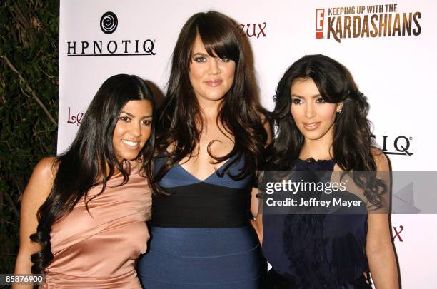 Socialites Kourtney Kardashian, Khloe Kardahian and Kim Kardashian arrive to the season 2 launch party "Keeping Up With The Kardashians" at Les Deux...