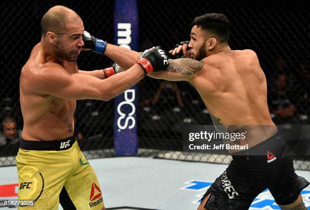 Brad Tavares punches Thales Leites of Brazil in their middleweight bout during the UFC 216 event inside T-Mobile Arena on October 7, 2017 in Las...