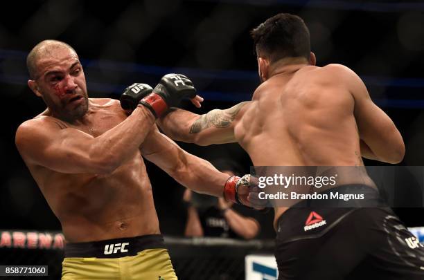 Brad Tavares punches Thales Leites of Brazil in their middleweight bout during the UFC 216 event inside T-Mobile Arena on October 7, 2017 in Las...