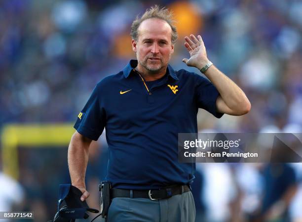 Head coach Dana Holgorsen of the West Virginia Mountaineers reacts to a play against the TCU Horned Frogs in the fourth quarter at Amon G. Carter...