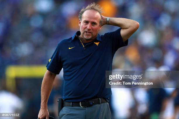 Head coach Dana Holgorsen of the West Virginia Mountaineers reacts to a play against the TCU Horned Frogs in the fourth quarter at Amon G. Carter...