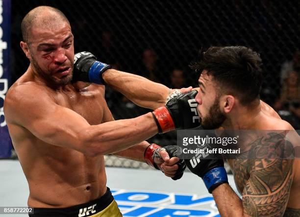 Brad Tavares punches Thales Leites of Brazil in their middleweight bout during the UFC 216 event inside T-Mobile Arena on October 7, 2017 in Las...