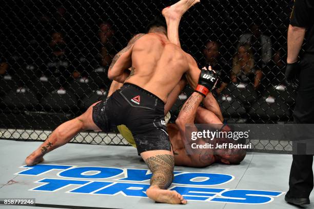 Brad Tavares punches Thales Leites of Brazil in their middleweight bout during the UFC 216 event inside T-Mobile Arena on October 7, 2017 in Las...