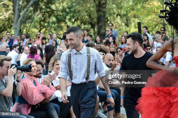 Designer David Ferreira walks the catwalk at the end of his show during Lisboa Fashion Week 'ModaLisboa' 2017 on October 7, 2017 in Lisboa CDP,...