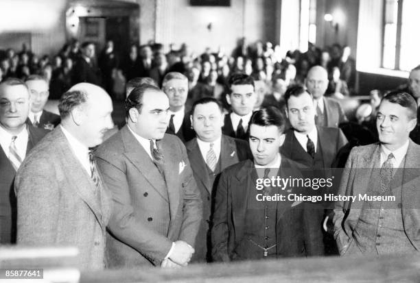 Al Capone, pictured in court during his trial, Chicago, 1931. He was sentenced to a 10 years in federal prison and one year in county jail for a...