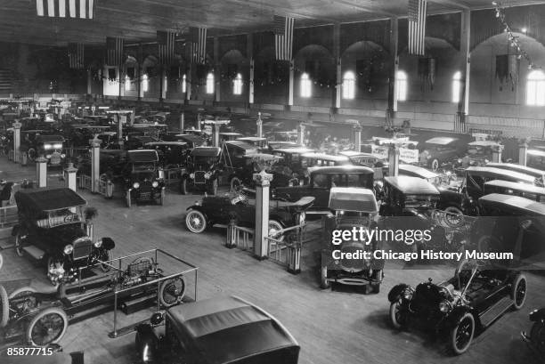 An auto show in Chicago's North Side neighborhood shows off the year's new cars. During the first decade of the 20th century, Chicago was home to 28...