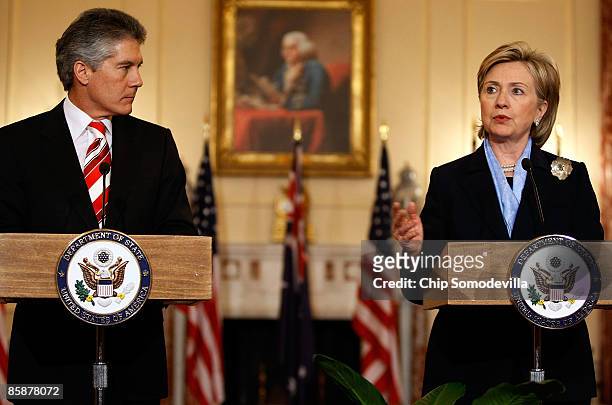 Secretary of State Hillary Clinton answers a reporter's question during a news conference with Australian Foreign Minister Stephen Smith in the...