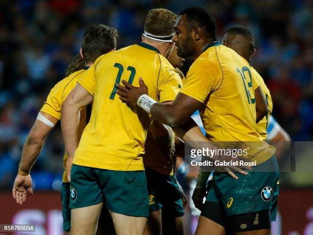 Reece Hodge of Australia celebrates with teammate Tevita Kuridrani after scoring a try during The Rugby Championship match between Argentina and...
