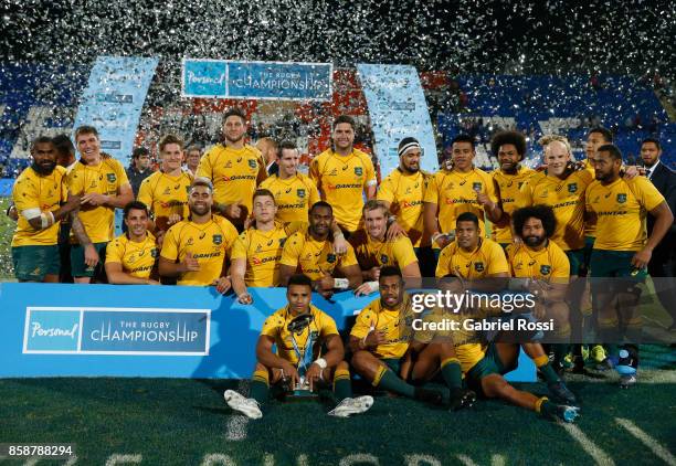 Players of Australia pose for a photo after winning The Rugby Championship match between Argentina and Australia at Malvinas Argentinas Stadium on...