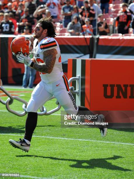 Fullback Danny Vitale of the Cleveland Browns runs onto the field as the team is introduced to the crowd prior to a game on October 1, 2017 against...