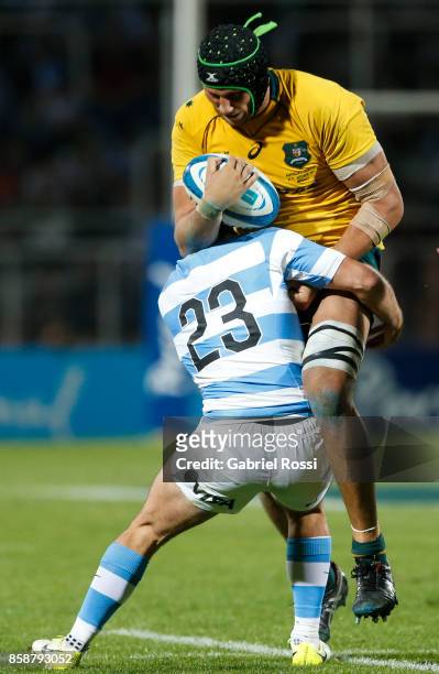 Adam Coleman of Australia is tackled by Santiago Cordero of Argentina during The Rugby Championship match between Argentina and Australia at Malvinas...