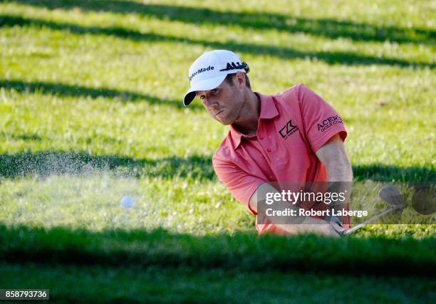 Tyler Duncan plays his shot out of the bunker on the 17th tee during the third round of the Safeway Open at the North Course of the Silverado Resort...