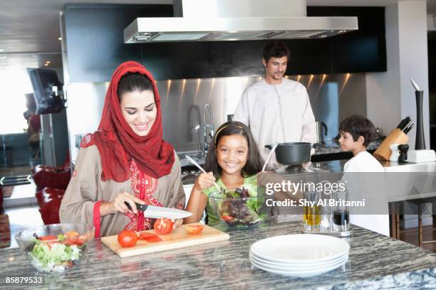 arab family in kitchen. - jalabib imagens e fotografias de stock