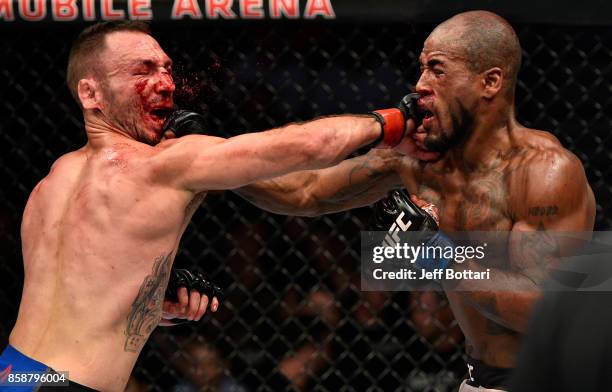 Lando Vannata and Bobby Green trade punches in their lightweight bout during the UFC 216 event inside T-Mobile Arena on October 7, 2017 in Las Vegas,...