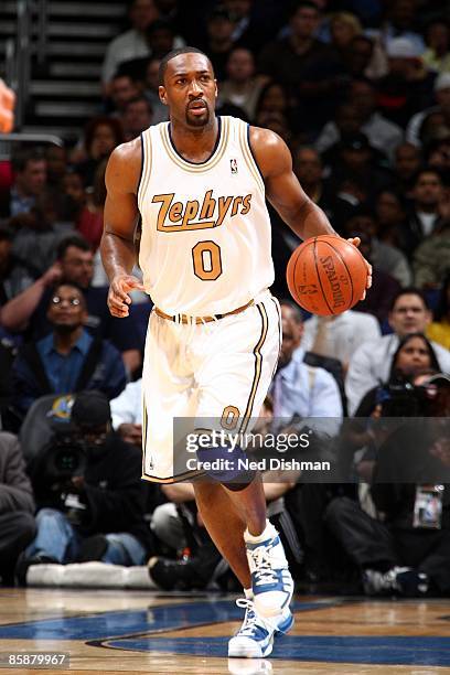 Gilbert Arenas of the Washington Wizards moves the ball up court during the game against the Cleveland Cavaliers at the Verizon Center on April 2,...