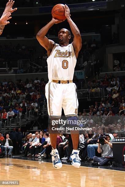 Gilbert Arenas of the Washington Wizards shoots a jump shot during the game against the Cleveland Cavaliers at the Verizon Center on April 2, 2009 in...