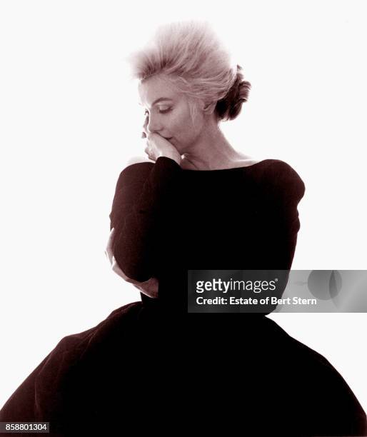 American actress Marilyn Monroe , wearing an evening dress, Beverly Hills, California, July 1962. The two sessions for the photoshoot took place in...