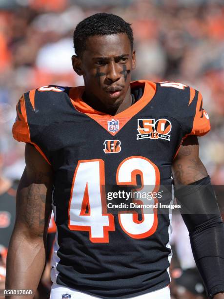 Safety George Iloka of the Cincinnati Bengals walks along the sideline in the third quarter of a game on October 1, 2017 against the Cleveland Browns...
