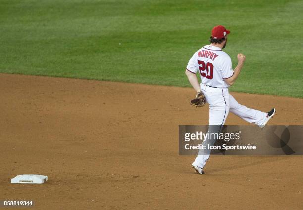 Washington Nationals second baseman Daniel Murphy celebrate his double play that ended the game during game two of the NLDS between the Chicago Cubs...