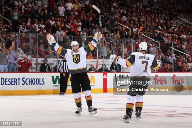 James Neal of the Vegas Golden Knights celebrates alongside Jason Garrison after Neal scored the game winning goal in overtime of the NHL game...