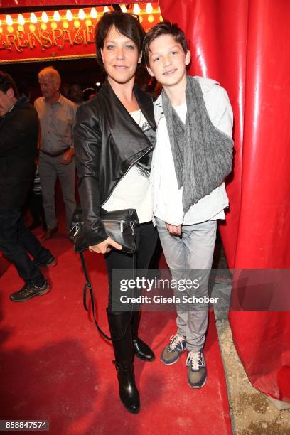 Janina Hartwig and her son David Hartwig during the premiere of the Circus Roncalli '40 Jahre Reise zum Regenbogen' on October 7, 2017 in Munich,...