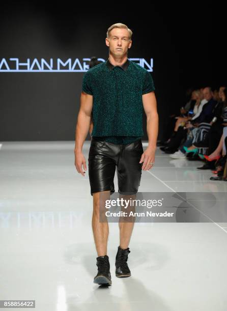 Model walks the runway wearing Jonathan Marc Stein at Los Angeles Fashion Week SS18 Art Hearts Fashion LAFW on October 7, 2017 in Los Angeles,...