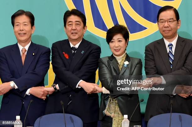 Leaders of Japan's political parties, from L-R: head of coalition ruling Komeito Natsuo Yamaguchi, ruling Liberal Democratic Party President and...