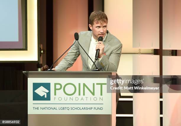 Auctioneer Gabriel Butu speaks onstage at Point Honors Los Angeles 2017, benefiting Point Foundation, at The Beverly Hilton Hotel on October 7, 2017...