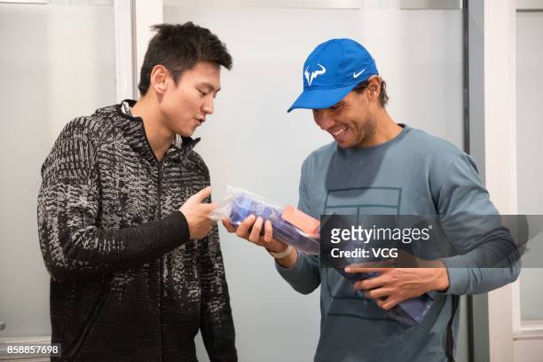 Chinese swimmer Ning Zetao meets with Spanish tennis player Rafael Nadal on day eight of 2017 China Open on October 7, 2017 in Beijing, China.