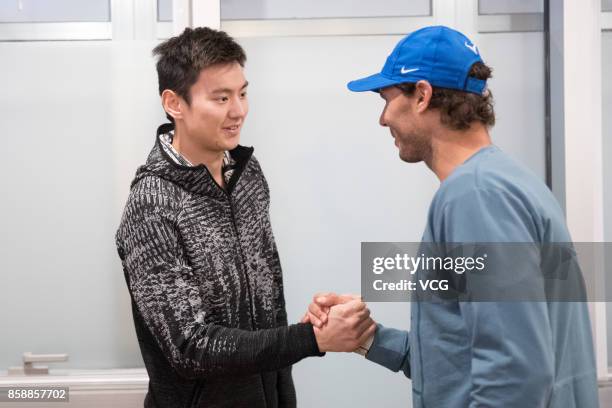 Chinese swimmer Ning Zetao meets with Spanish tennis player Rafael Nadal on day eight of 2017 China Open on October 7, 2017 in Beijing, China.