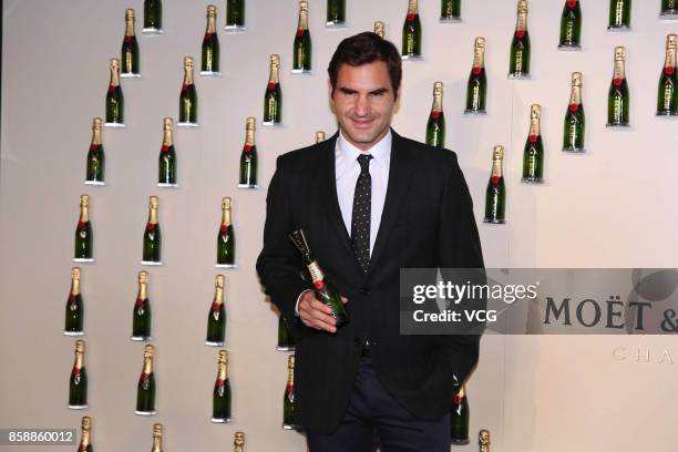 Roger Federer of Switzerland attends a Moet & Chandon activity ahead of the 2017 ATP 1000 Shanghai Rolex Masters on October 7, 2017 in Shanghai,...