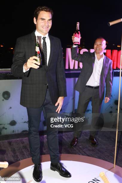 Roger Federer of Switzerland attends a Moet & Chandon activity ahead of the 2017 ATP 1000 Shanghai Rolex Masters on October 7, 2017 in Shanghai,...
