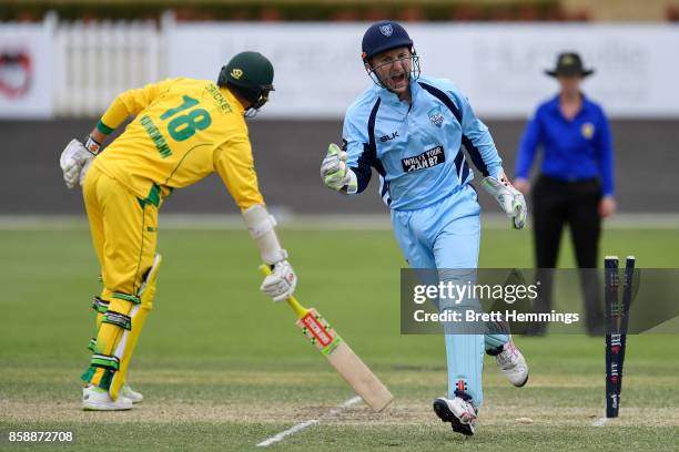 Peter Nevill of NSW celebrates after taking the stumping wicket of Matthew Kuhnemann of CAXI during the JLT One Day Cup match between New South Wales...