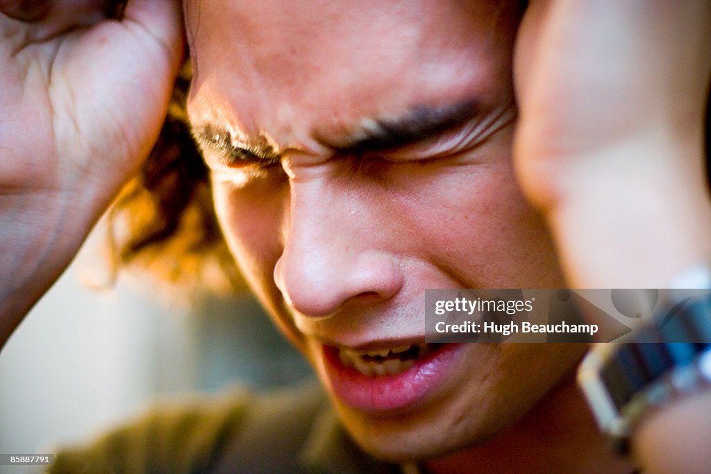 Angused Anguished Face