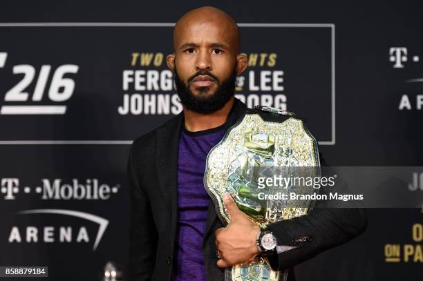 Featherweight champion Demetrious Johnson poses for a picture during the UFC 216 event inside TMobile Arena on October 7, 2017 in Las Vegas, Nevada.