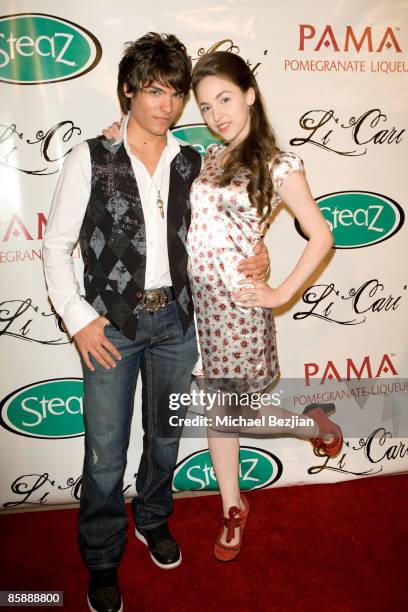 Recording artist Vincent Tomas and actress Brittany Curran attend Diane Merrick Boutique's launch party on April 9, 2009 in Los Angeles, California.