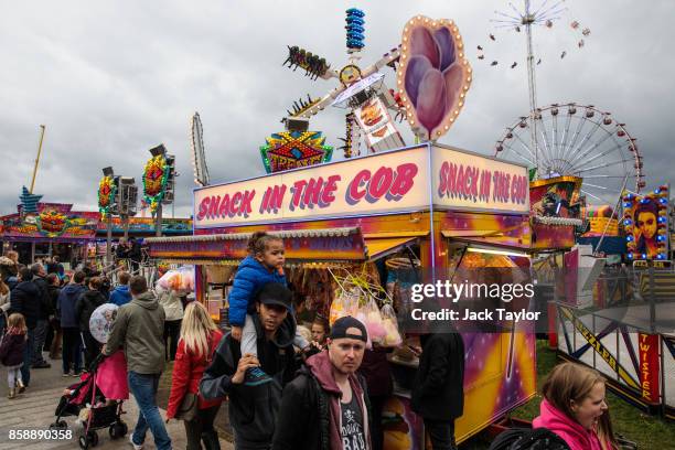 Visitors enjoy the attractions at the Nottingham Goose Fair in the Forest Recreation Ground on October 7, 2017 in Nottingham, England. The annual...