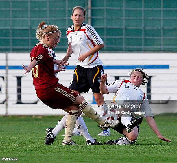 Anna Cholovyaga of Russia challenges Lynn Mester, Laura Vetterlein and Claudia Götte of Germany during the U17 Women international friendly match...