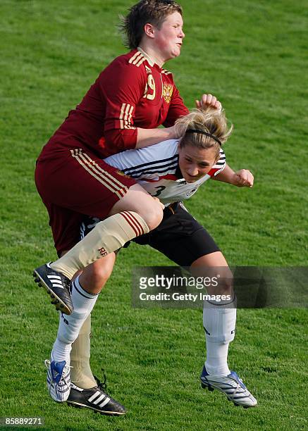 Irina Zinovyeva of Russia fouls Laura Vetterlein of Germany during the U17 Women international friendly match between Germany and Russia at the...