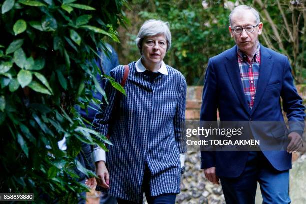 British Prime Minister Theresa May and her husband Philip May arrive to attend the Sunday morning service at a church in her Maidenhead constituency...