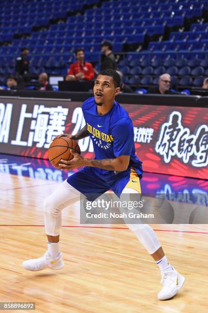 Michael Gbinije of the Golden State Warriors warms up before the game against the Minnesota Timberwolves as part of 2017 NBA Global Games China on...