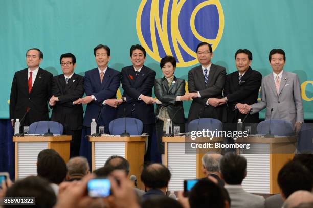 Tadatomo Yoshida, president of the Social Democratic Party, from left, Ichiro Matsui, governor of Osaka and secretary-general of Japan Restoration...