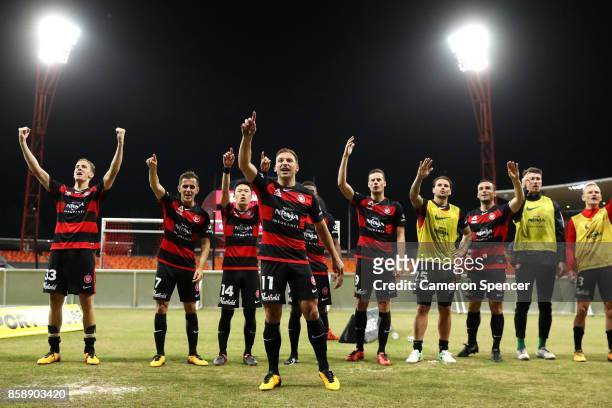 Brendon Santalab of the Wanderers and team mates thank fans after winning the round one A-League match between the Western Sydney Wanderers and the...