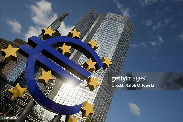 Huge euro logo stands in front of the headquarters of the European Central Bank on April 9, 2009 in Frankfurt am Main, Germany. The city of...