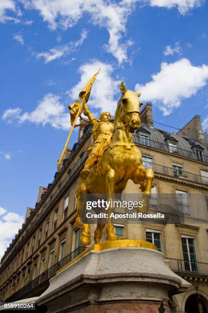 paris, golden statue of joan of arc on horseback, place des pyramides - place des pyramides stock pictures, royalty-free photos & images
